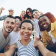 Group selfie of smiling friends